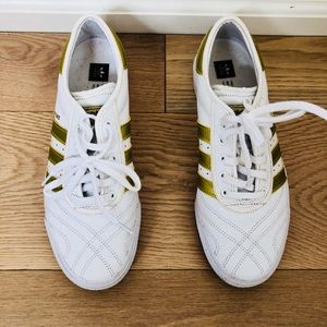 Gold and white limited edition adidas skate shoes